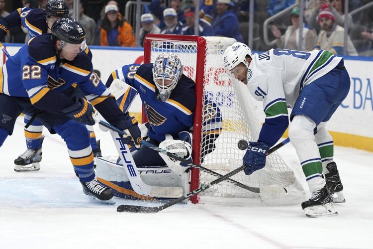 Broberg scores in OT to lift Blues over Canucks 4-3 for 4th straight win