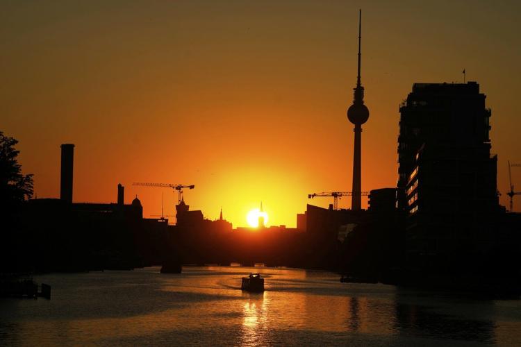 Europe sizzles and the Eiffel Tower's summit closes