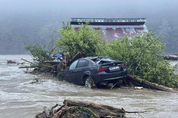 Flash floods in Romania kill at least 3 people and force hundreds of evacuations