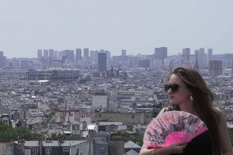 In France's historic heat wave, Paris’ dreamy rooftops become a heat-trapping nightmare