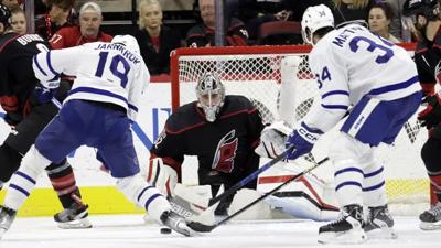 Aho's late goal lifts Hurricanes past Maple Leafs 5-3