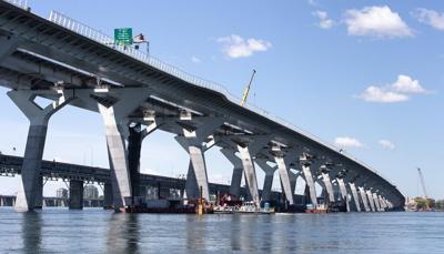 A Quebec coroner says Montreal's Champlain Bridge needs anti-suicide barrier