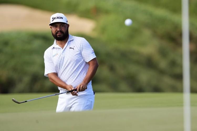 Morikawa pulls away with late run of birdies at Kapalua