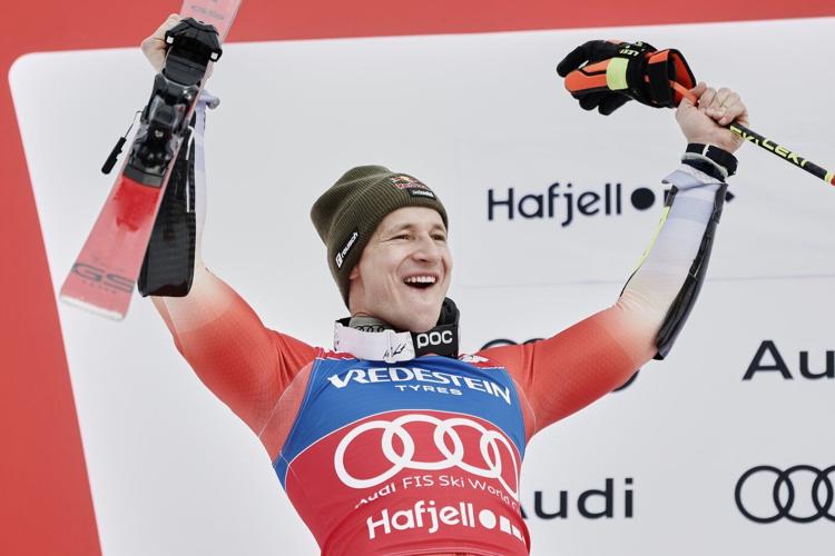 Swiss ski star Odermatt secures overall and GS World Cup titles in race won by teammate Meillard