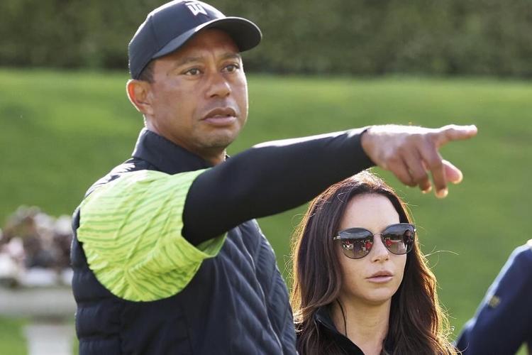Tiger Woods' lawyers try to stop ex-girlfriend's lawsuit