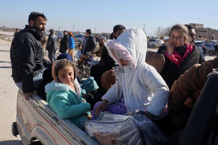 Civilians flee on foot as Syrian military offensive looms east of Aleppo