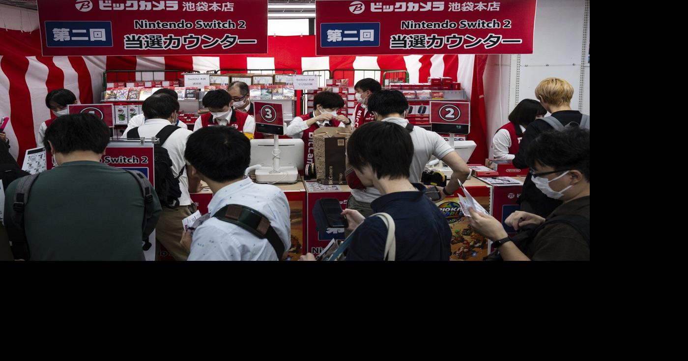 Fans around the world queue up in long lines for the highly anticipated ...
