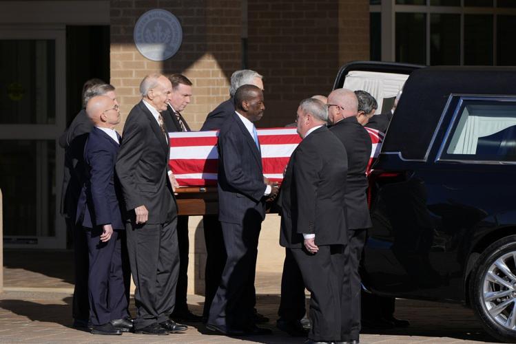 Jimmy Carter's flag-draped casket is on its way to Atlanta as 39th president's state funeral begins