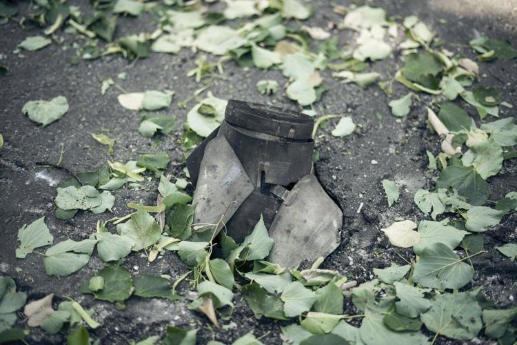 Russian rockets kill 4 in a Ukrainian city as Kyiv claims it damaged a key bridge