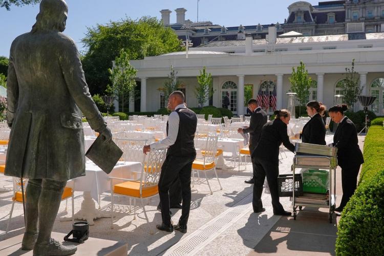 Inside Trump's remake of the White House Rose Garden. First a stone patio, then statues