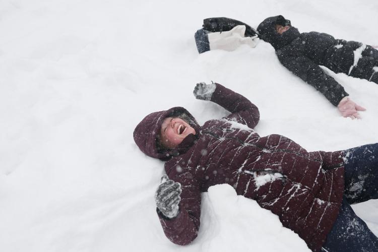 Northeast sees more snow from the tail end of a colossal winter storm, at least 18 deaths reported