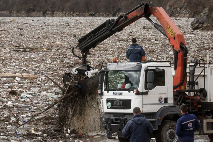 As winter comes, so does garbage. A river in Bosnia chokes in tons of waste year after year