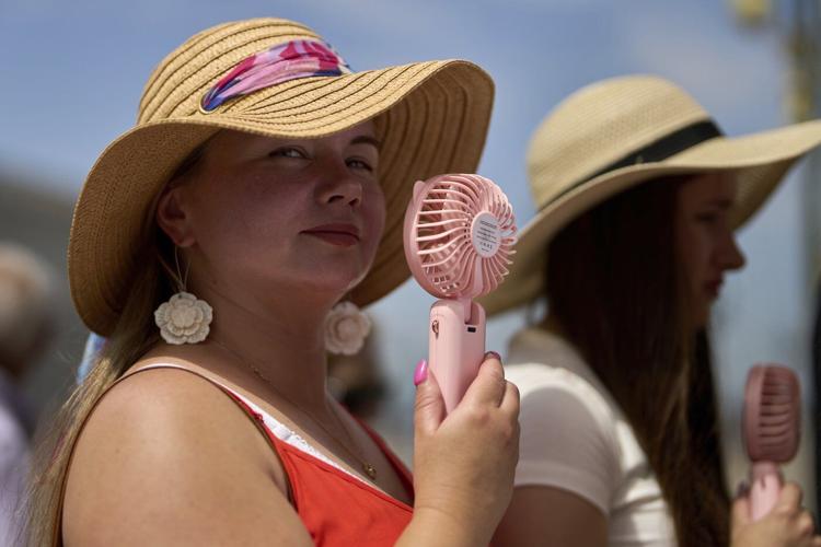 Barcelona records hottest June and Eiffel Tower's summit closes as Europe sizzles