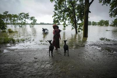 Floods and landslides triggered by heavy rains in India's northeast kill at least 16 people