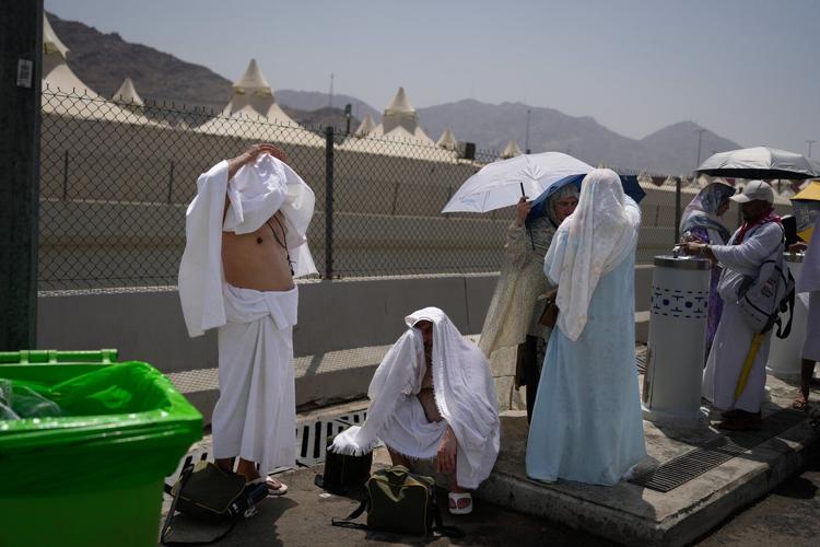Muslim pilgrims perform Hajj rituals under intense heat as Eid al-Adha celebrations start