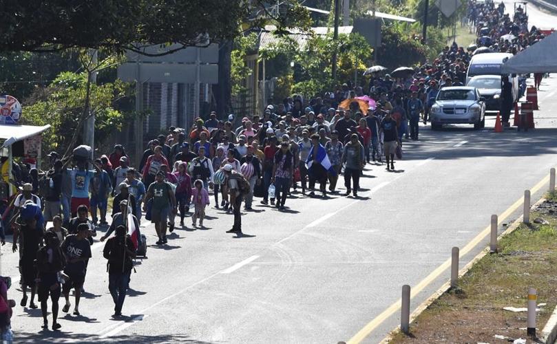 Migrant caravan in southern Mexico marks Christmas Day by trudging onward