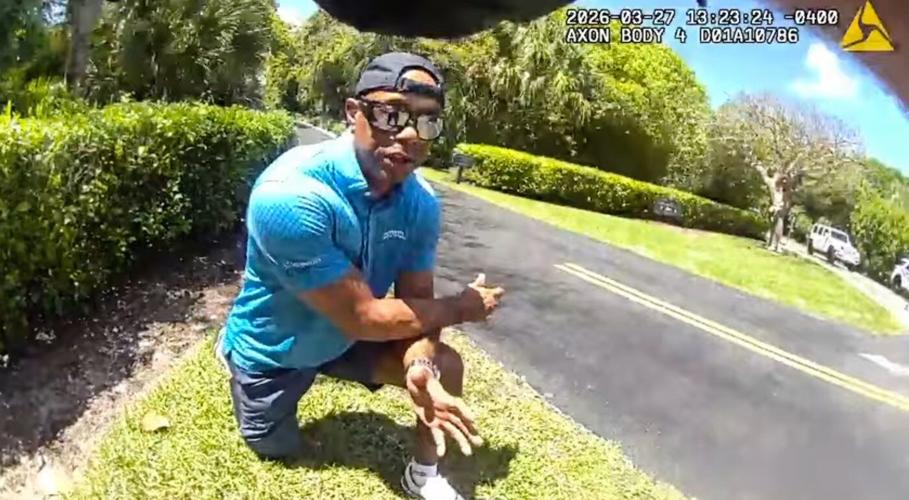 Bodycam shows a stunned Tiger Woods handcuffed after a Florida rollover crash