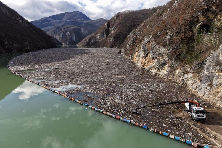As winter comes, so does garbage. A river in Bosnia chokes in tons of waste year after year