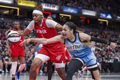 WNBA upgrades foul on Caitlin Clark by Chennedy Carter, fines Angel Reese for no postgame interview