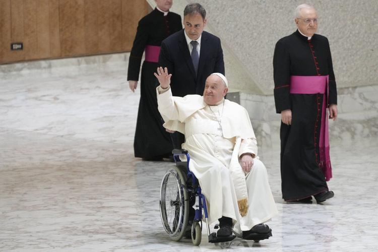 Pope Francis baptizes 21 babies in an annual ceremony at the Sistine Chapel