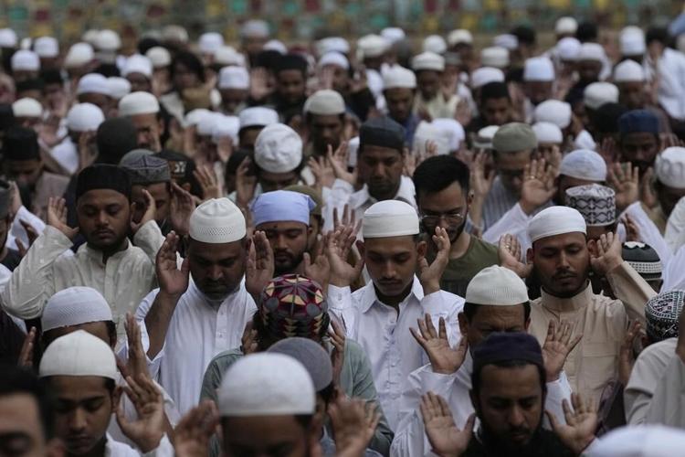 Muslims in Asia celebrate Eid al-Adha with sacrifice festival and traditional feast
