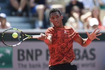 Auger-Aliassime falls in straight sets, Dabrowski wins doubles match at Citi