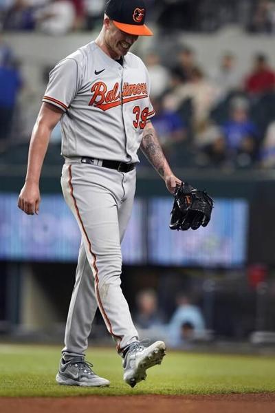 Orioles' Bradish struck on foot by liner, leaves vs. Rangers