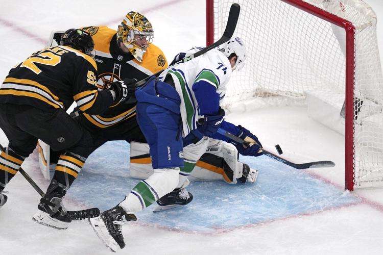 DeBrusk scores in return to Boston as Canucks shut out Bruins 2-0 behind Lankinen