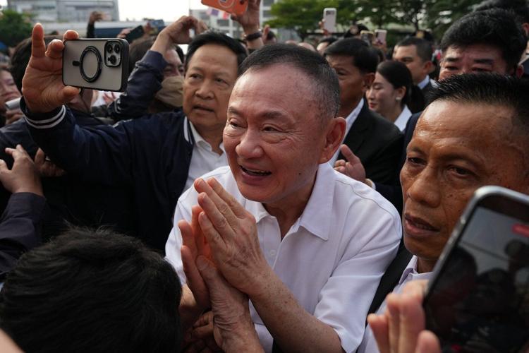 Thailand's Thaksin released from prison after serving 8 months for abuse of power