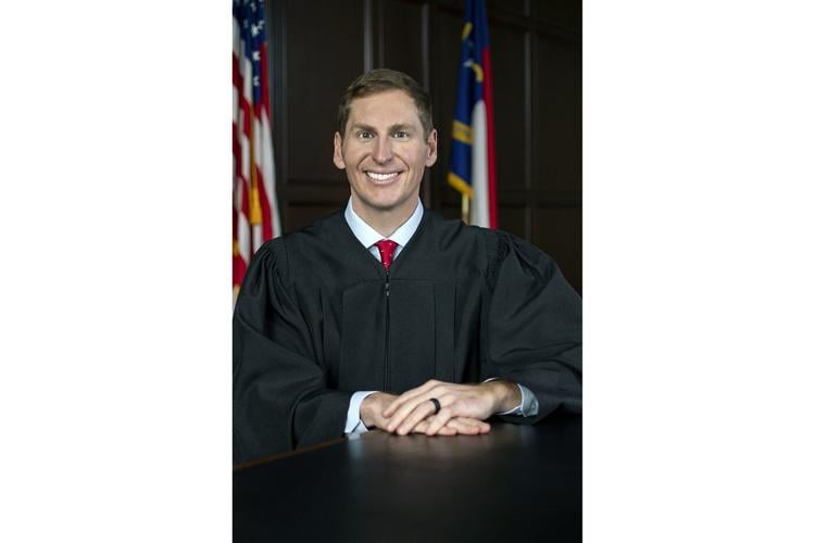 Legal challenge over extremely close North Carolina election stays in state court for now