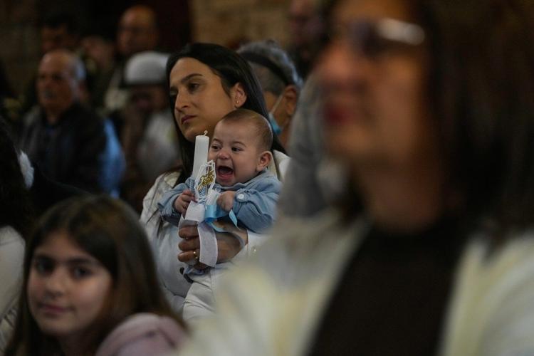 Photos show Lebanon's Catholics marking Palm Sunday as the shadow of war weighs heavily