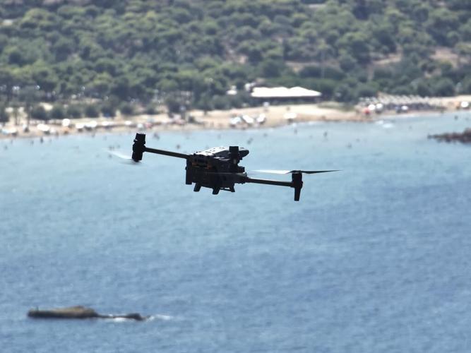 To stop wildfires, residents in some Greek suburbs put their own money toward early warning drones