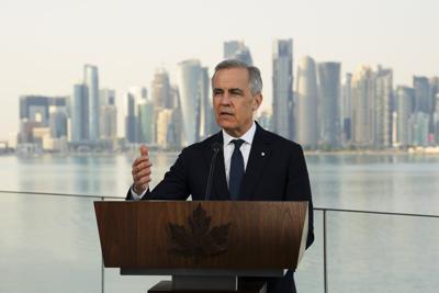In the news today: Carney goes to Davos, gun compensation, Chinese EV deal