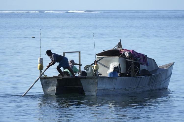 A Samoan village prepares to welcome King Charles but fears an uncertain future for its reef