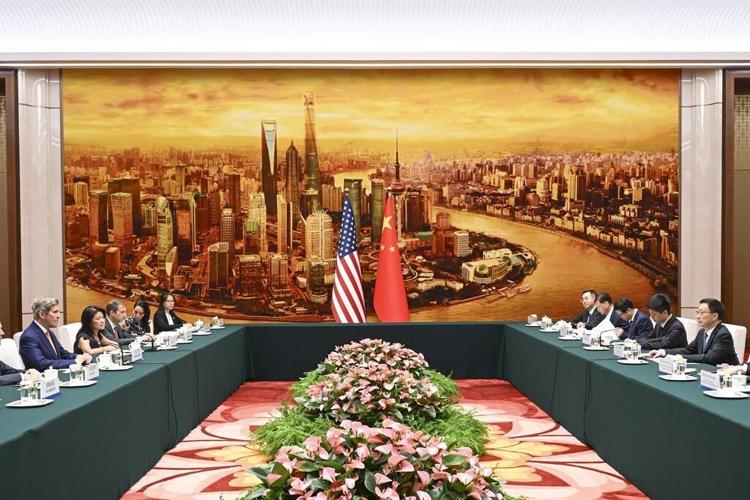 China says it will work with US on climate change as long as political conditions are met