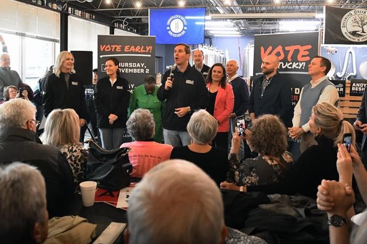Democratic Gov. Beshear downplays party labels in campaigning for 2nd term in GOP-leaning Kentucky