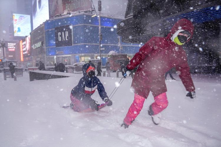 Northeast US digs out from brutal storm that disrupted flights and canceled school