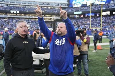 Record 5 1st-year coaches lead teams into NFL postseason