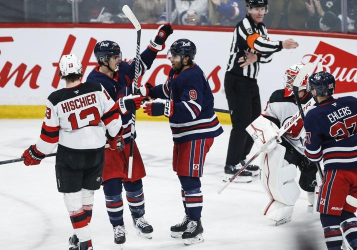 Iafallo scores twice, Jets down Devils 4-0 for 50th win this season