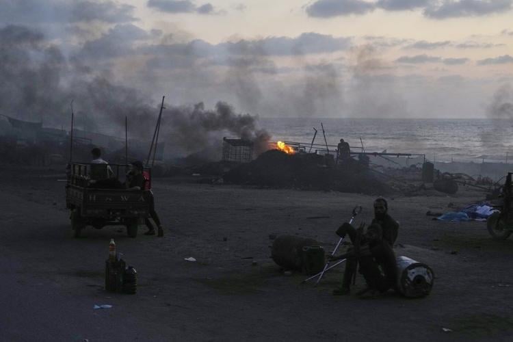 Israel's defense minister says Gaza City could be destroyed as Israeli strikes kill 17 Palestinians