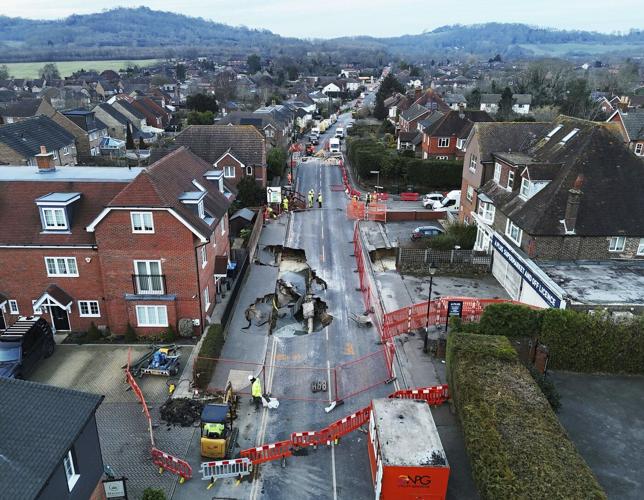 Sinkhole opens up on the main street of an English village