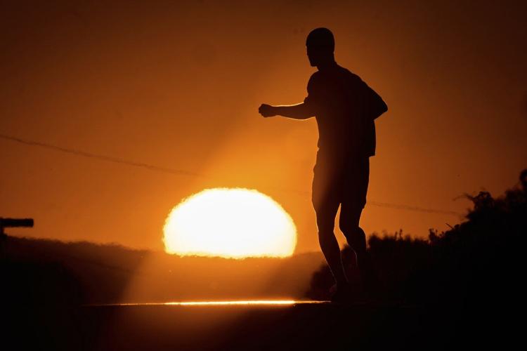 Barcelona records hottest June and Eiffel Tower's summit closes as Europe sizzles