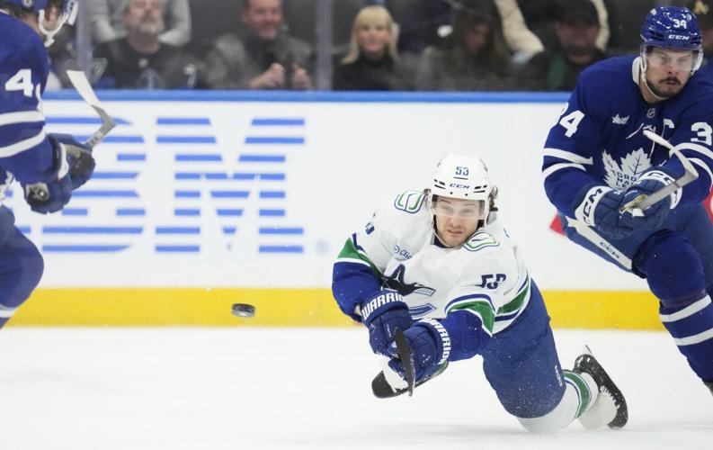 Canucks overcome travel woes to down Maple Leafs 3-0