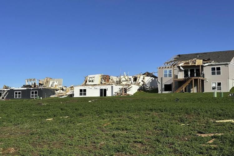 Residents begin going through the rubble after tornadoes hammer parts of Nebraska and Iowa