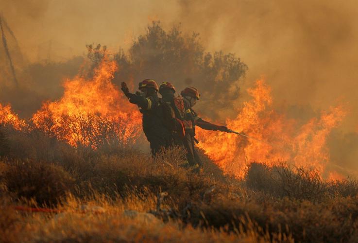 Firefighters race to contain wildfires in Greece as thousands evacuated, 2 die in Turkey