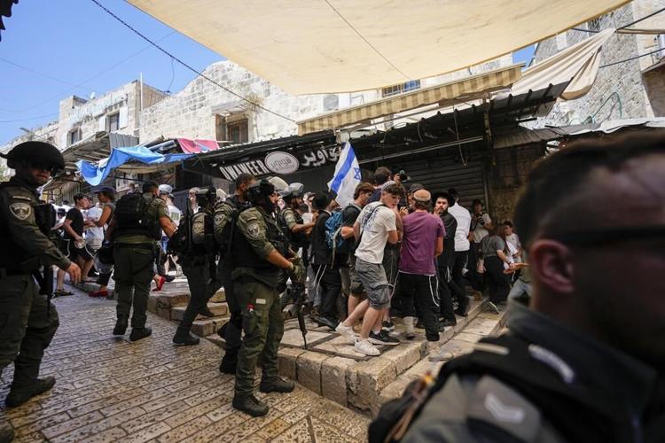 The Latest | Israeli troops launch attacks in central Gaza, possibly widening their offensive