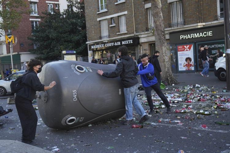 200 arrested in France as protesters clash with police