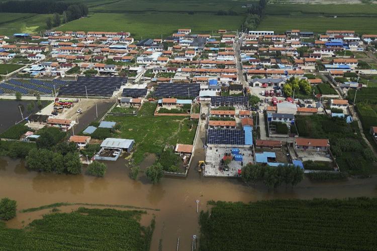 Beijing officials say 31 older people trapped in a senior center died in floods