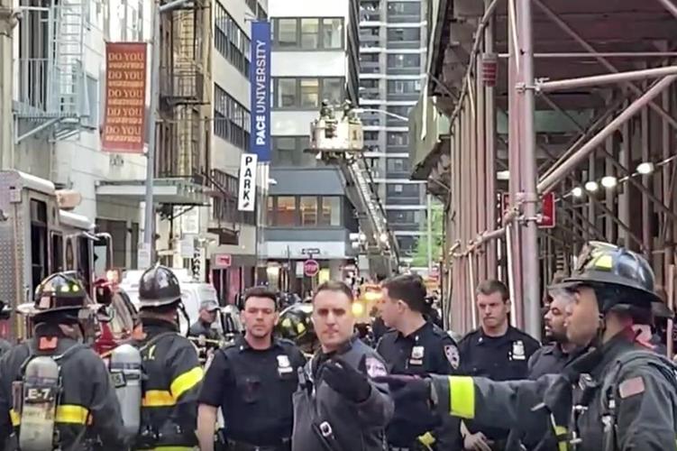 'Like an earthquake': Parking garage falls in NYC, killing 1