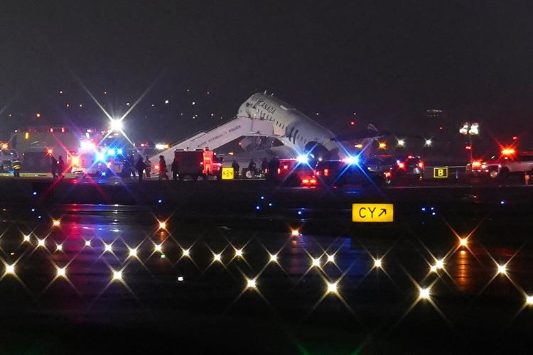 Air Canada flight collides with a Port Authority vehicle at New York's LaGuardia Airport